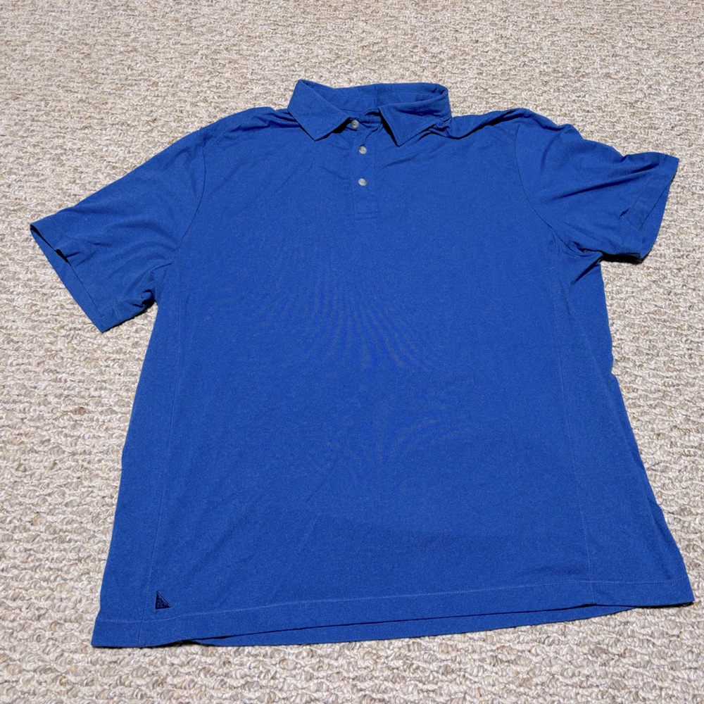 UNTICKit men’s performance polo in china blue.